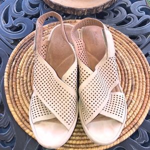 Nubuk leather crisscrossed Clark’s wedge sandal